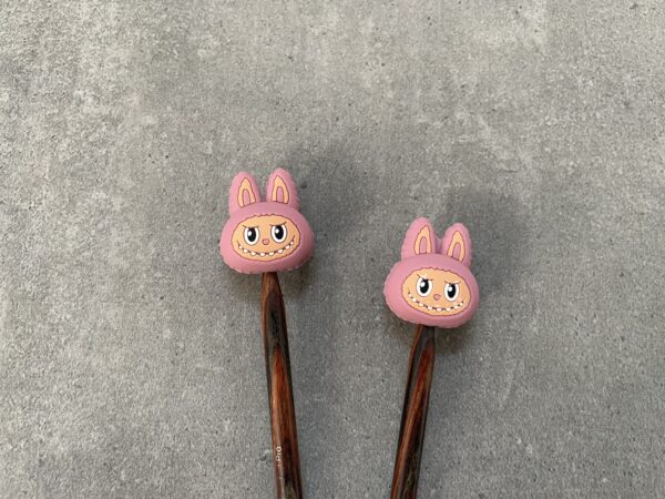 maschenstopper grinsekopf rosa